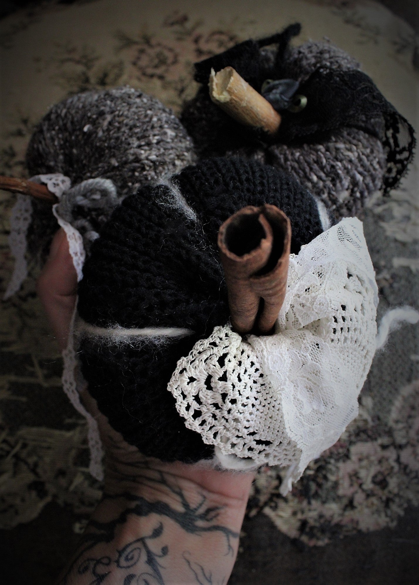 Black Knit Pumpkin Pillow Pouf, With Ivory Lace, Crochet Leaf and Cinnamon Stick Stem