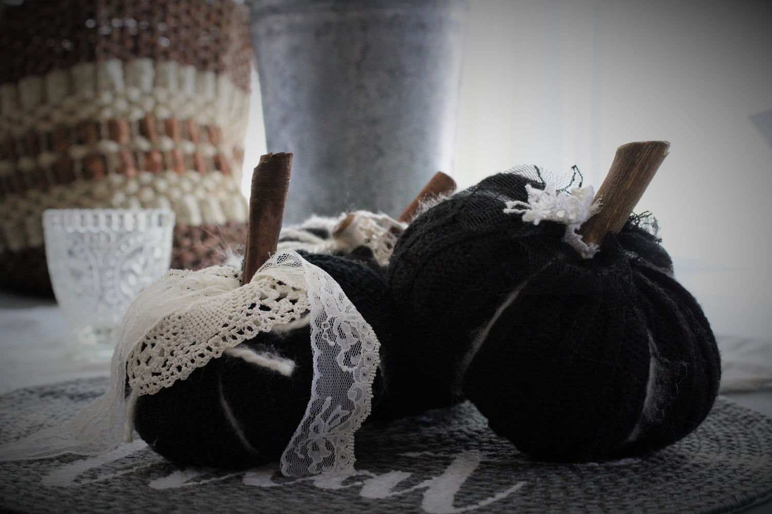 Black Knit Pumpkin Pillow Pouf, With Ivory Lace, Crochet Leaf and Cinnamon Stick Stem