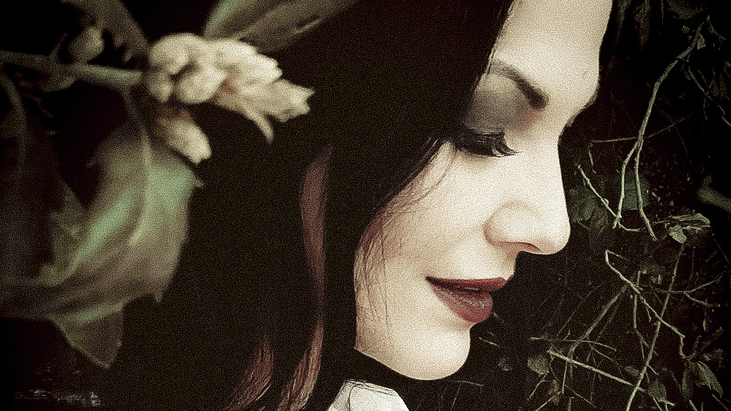 Profile of a beautiful woman with leaves in her hair, from Moss and Mourning