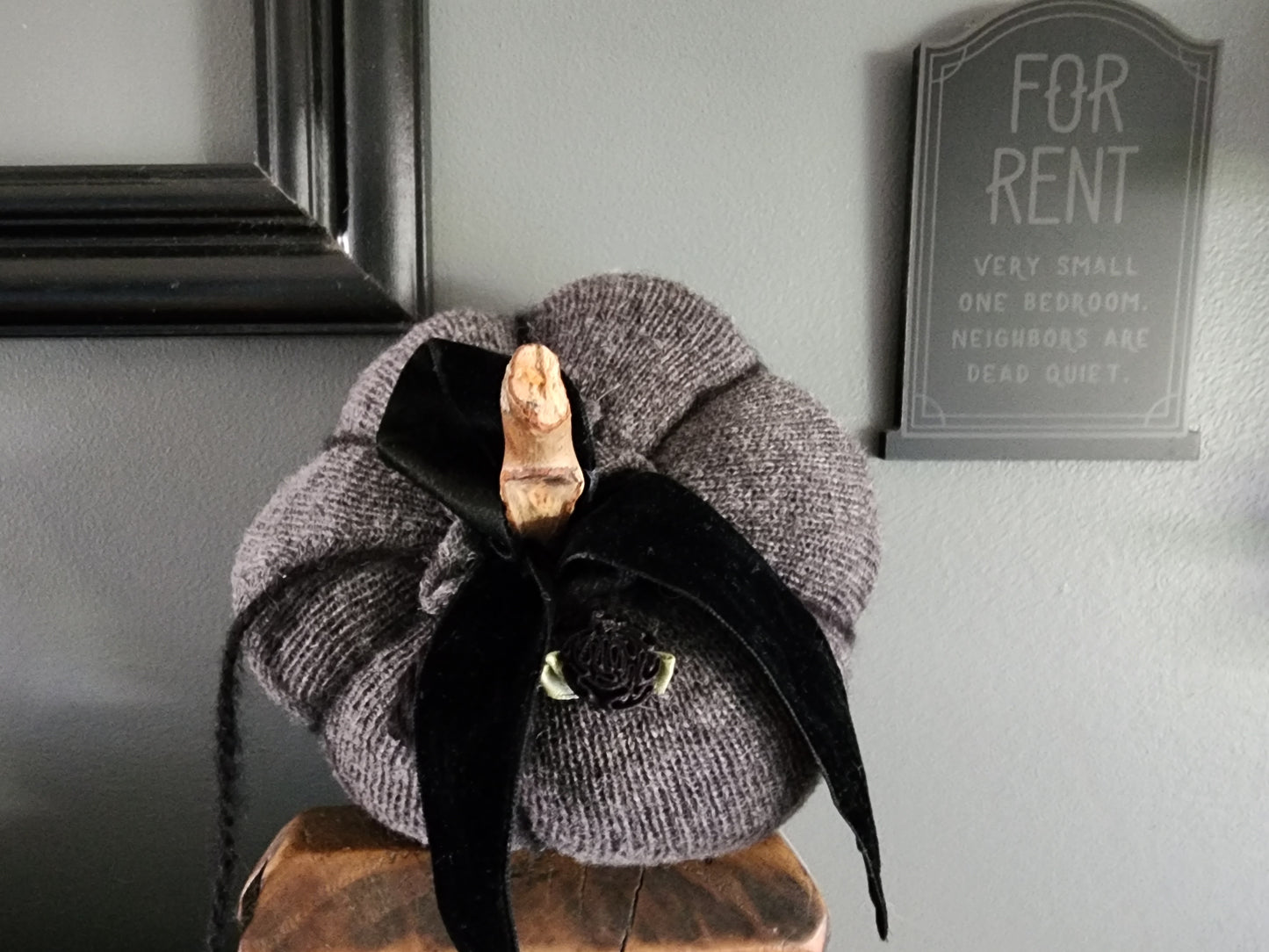 Knit Gray Cashmere Pumpkin Pillow With Black Velvet Ribbon, Flowers and a Stick Stem
