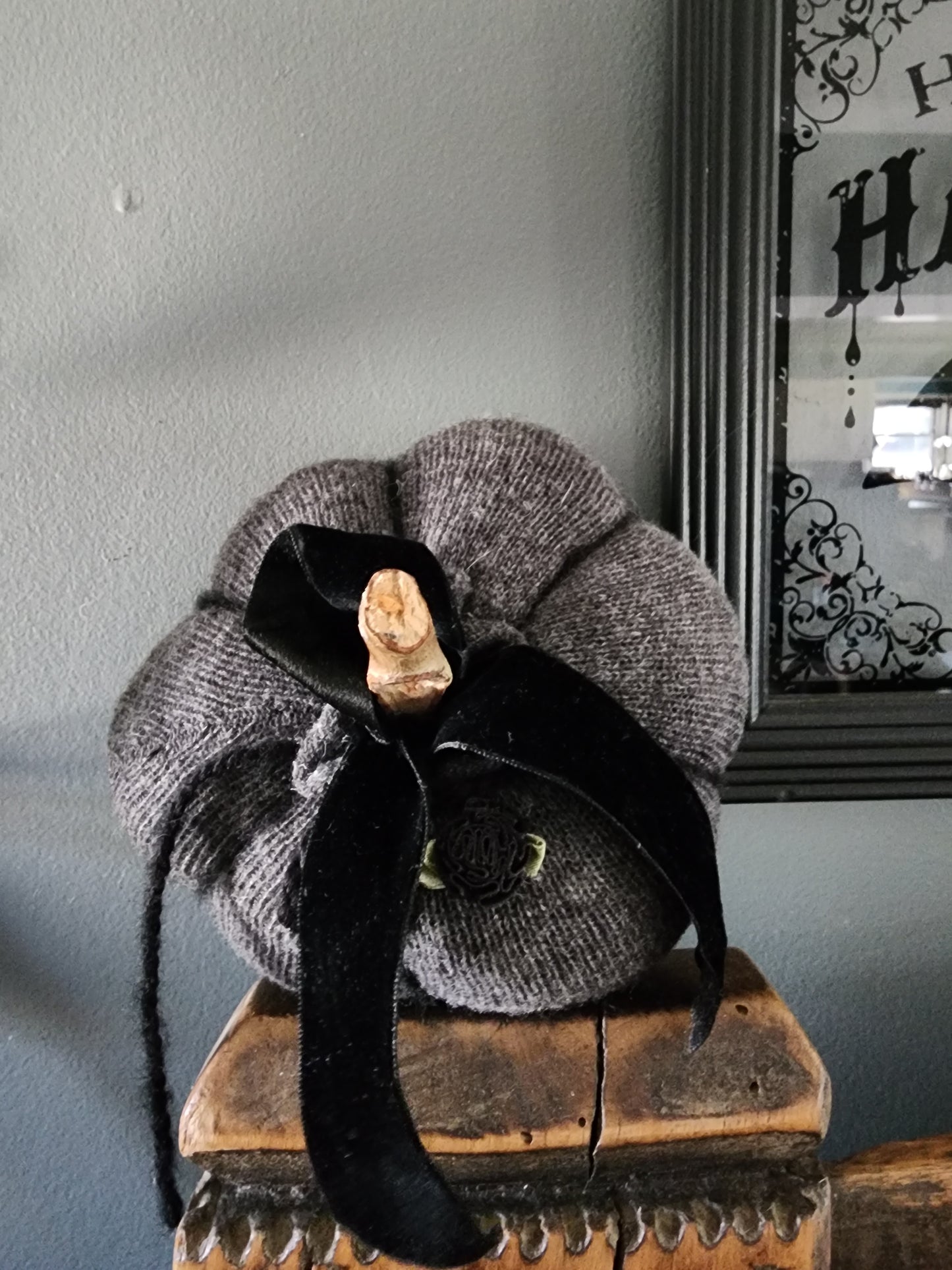 Knit Gray Cashmere Pumpkin Pillow With Black Velvet Ribbon, Flowers and a Stick Stem