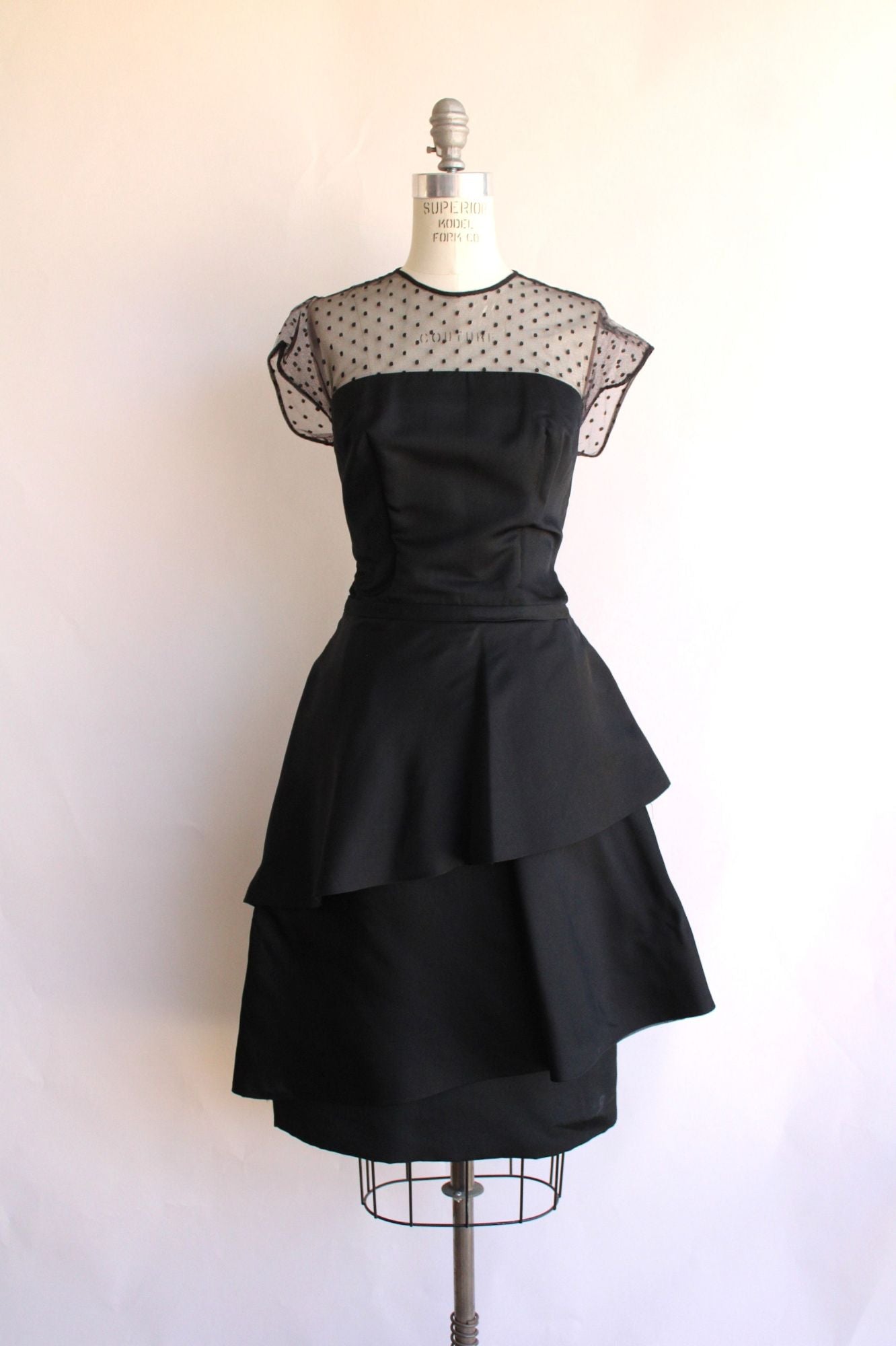 Vintage 1950s 1960s Black Cocktail Dress With Swiss Dot Illusion Lace Neckline and Tiered Skirt