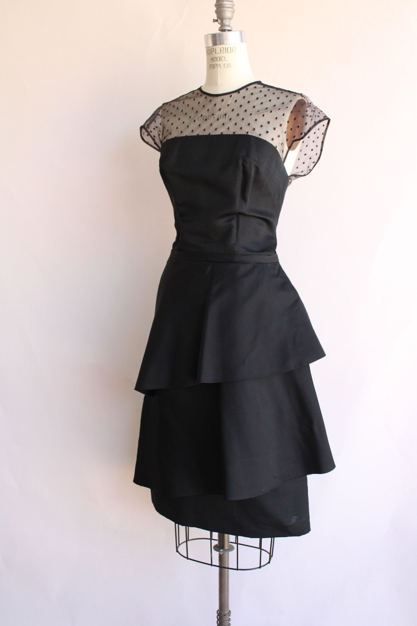 Vintage 1950s 1960s Black Cocktail Dress With Swiss Dot Illusion Lace Neckline and Tiered Skirt