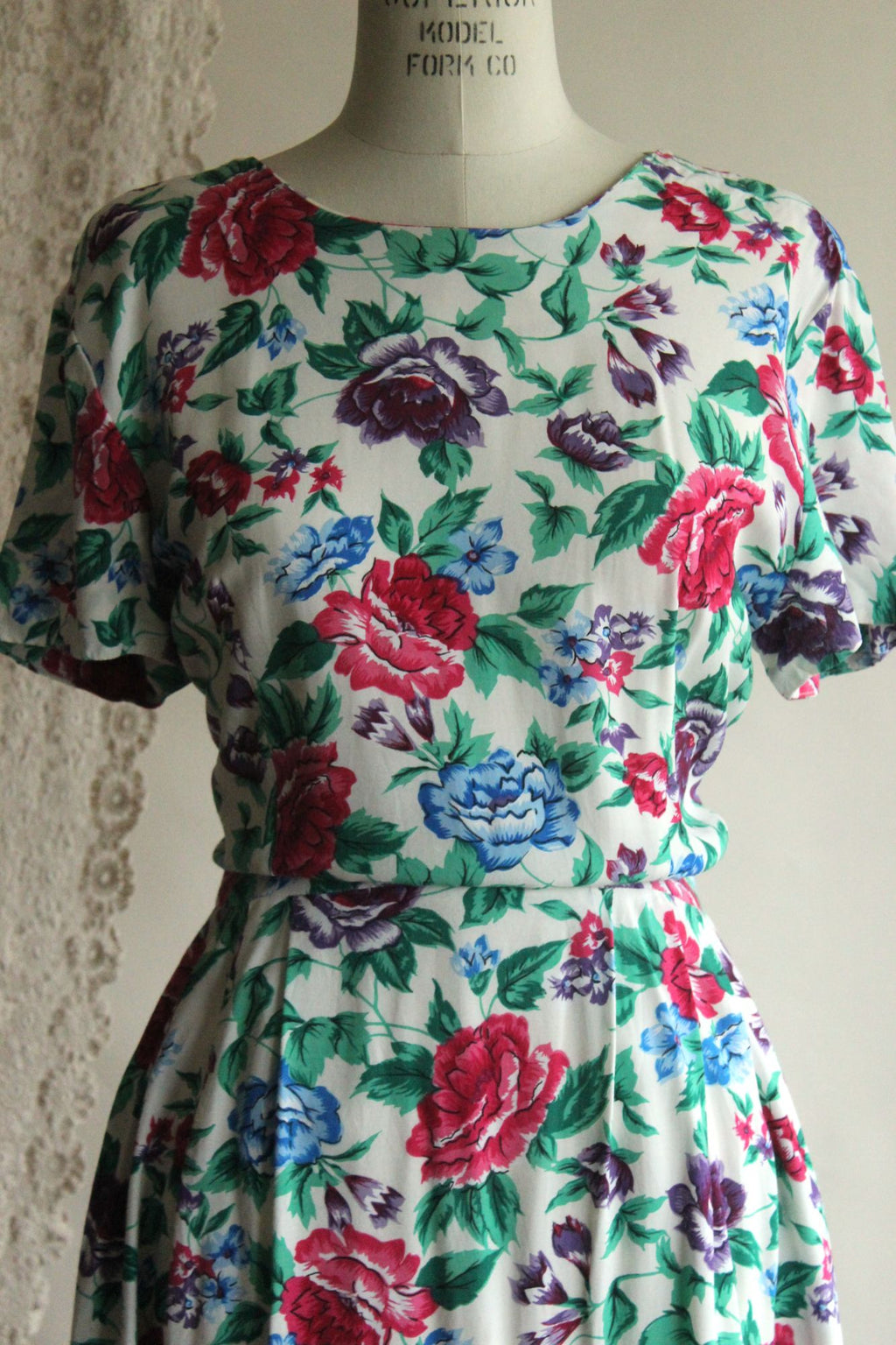 Vintage 1980's Tareti Howard Levi Floral print with Criss Cross Back,