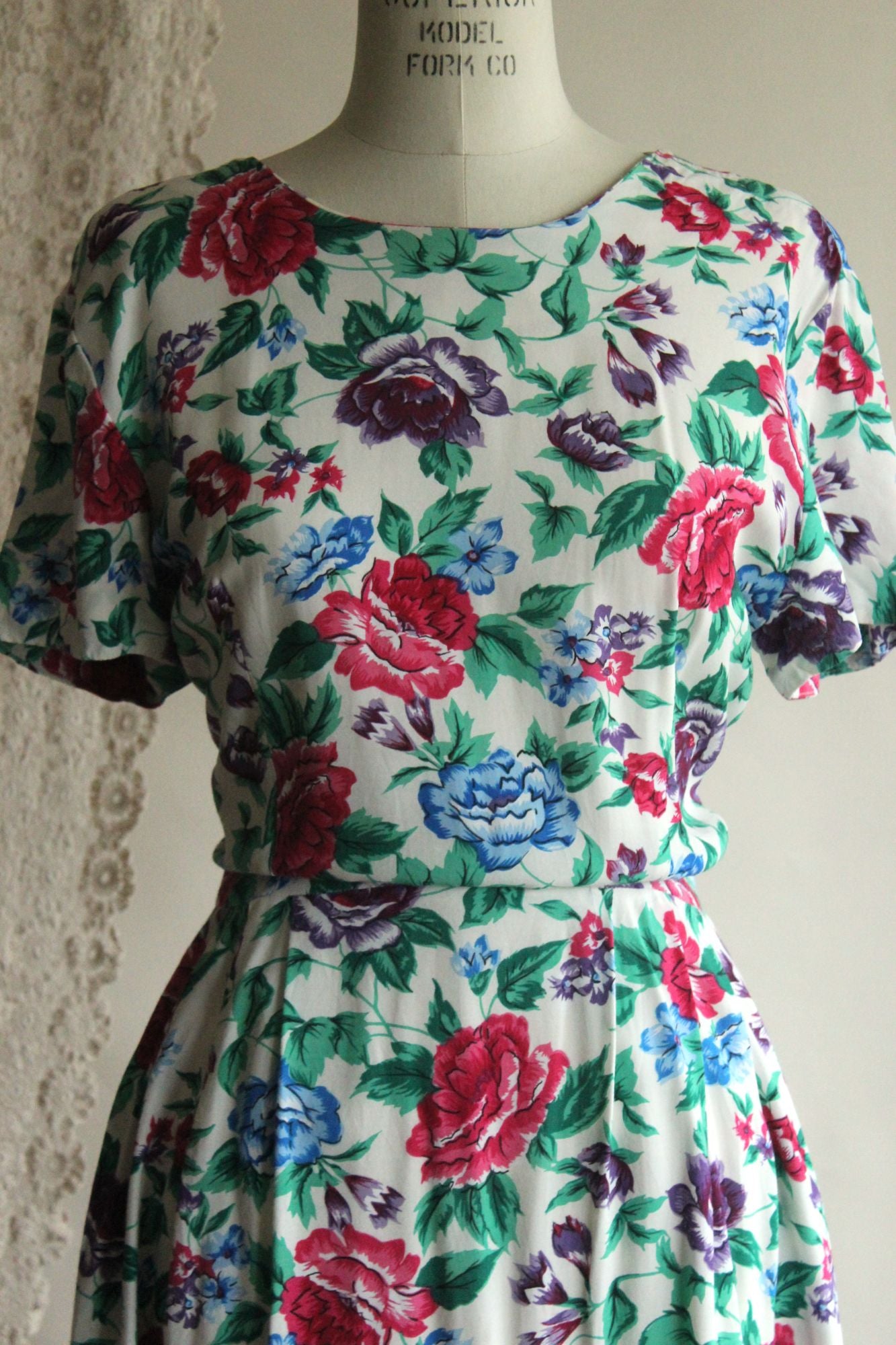 Vintage 1980's Tareti Howard Levi Floral print with Criss Cross Back,