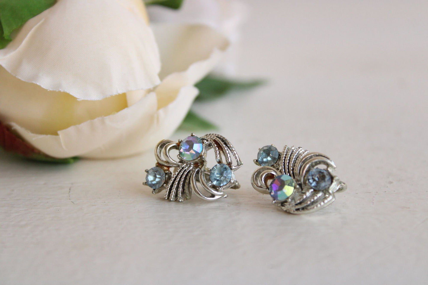 Vintage 1950s 1960s Coro Silver Tone Clip Ons With Pale Blue Rhinestone Center
