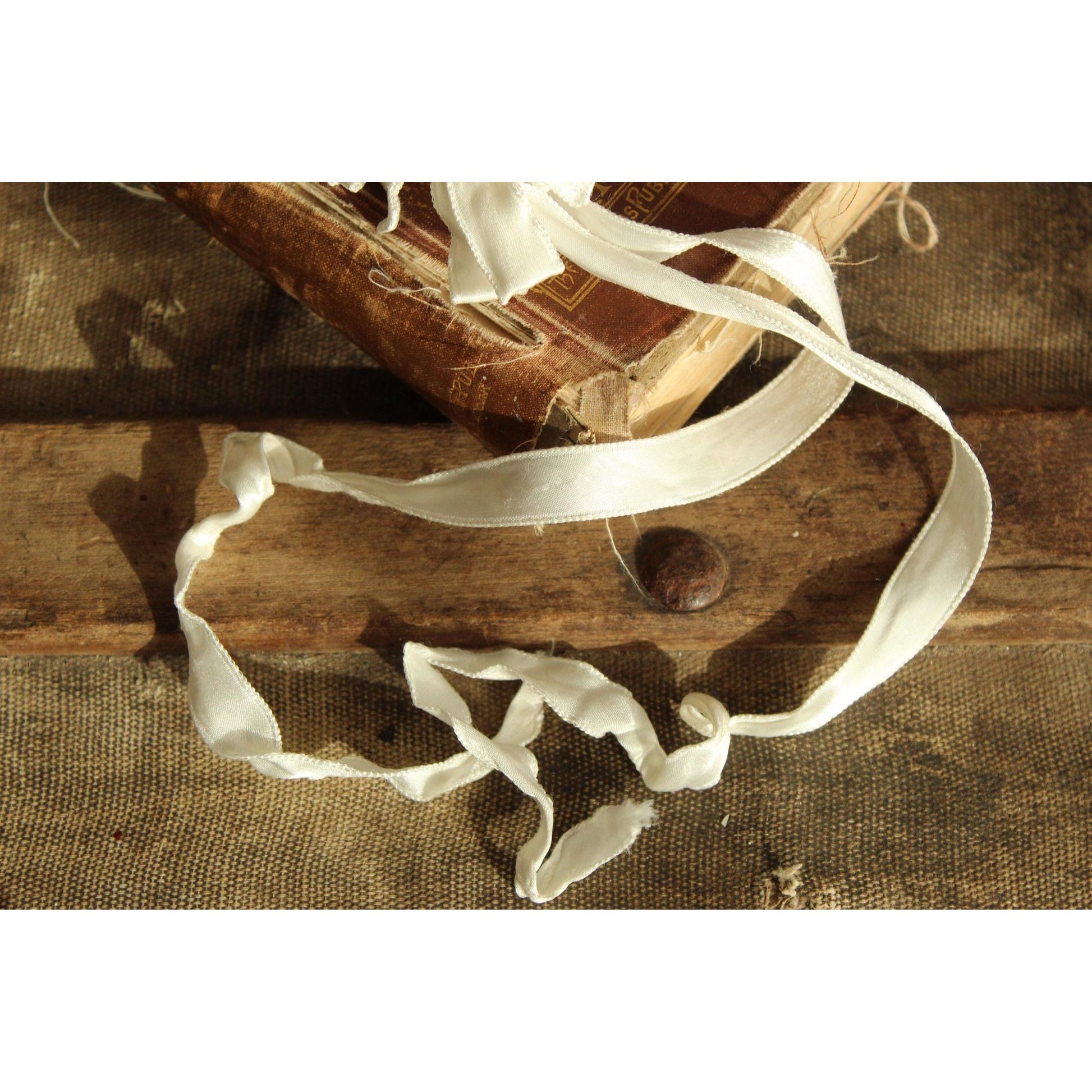 Vintage 1950s Winter White Knit baby bonnet with Ribbon Ties