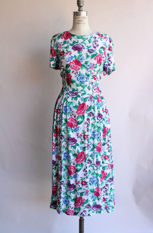 Vintage 1980's Tareti Howard Levi Floral print with Criss Cross Back,