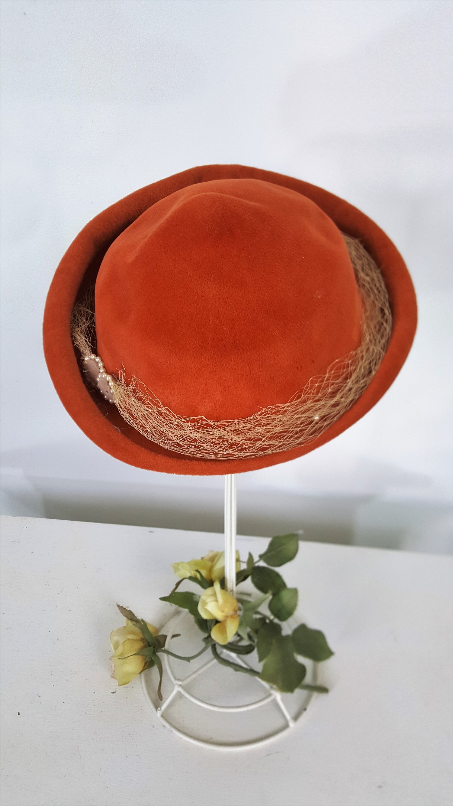 Vintage 1950s Dark Orange Wool Felt Hat with Birdcage Veil And Pearl Trim
