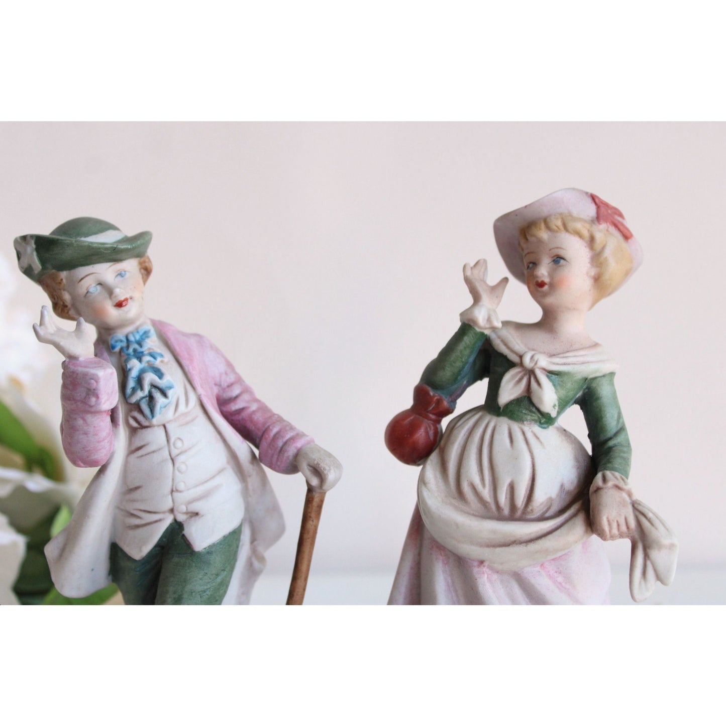 Vintage Bisque Porcelain Man and Woman Figurines