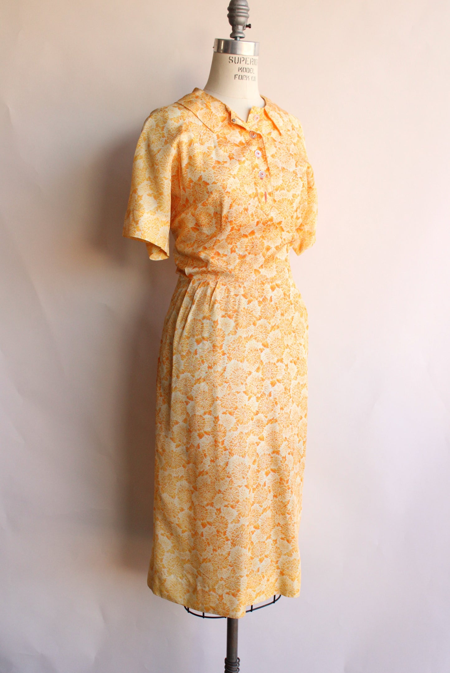 Vintage 1950s Day Dress in an Orange Abstract Floral