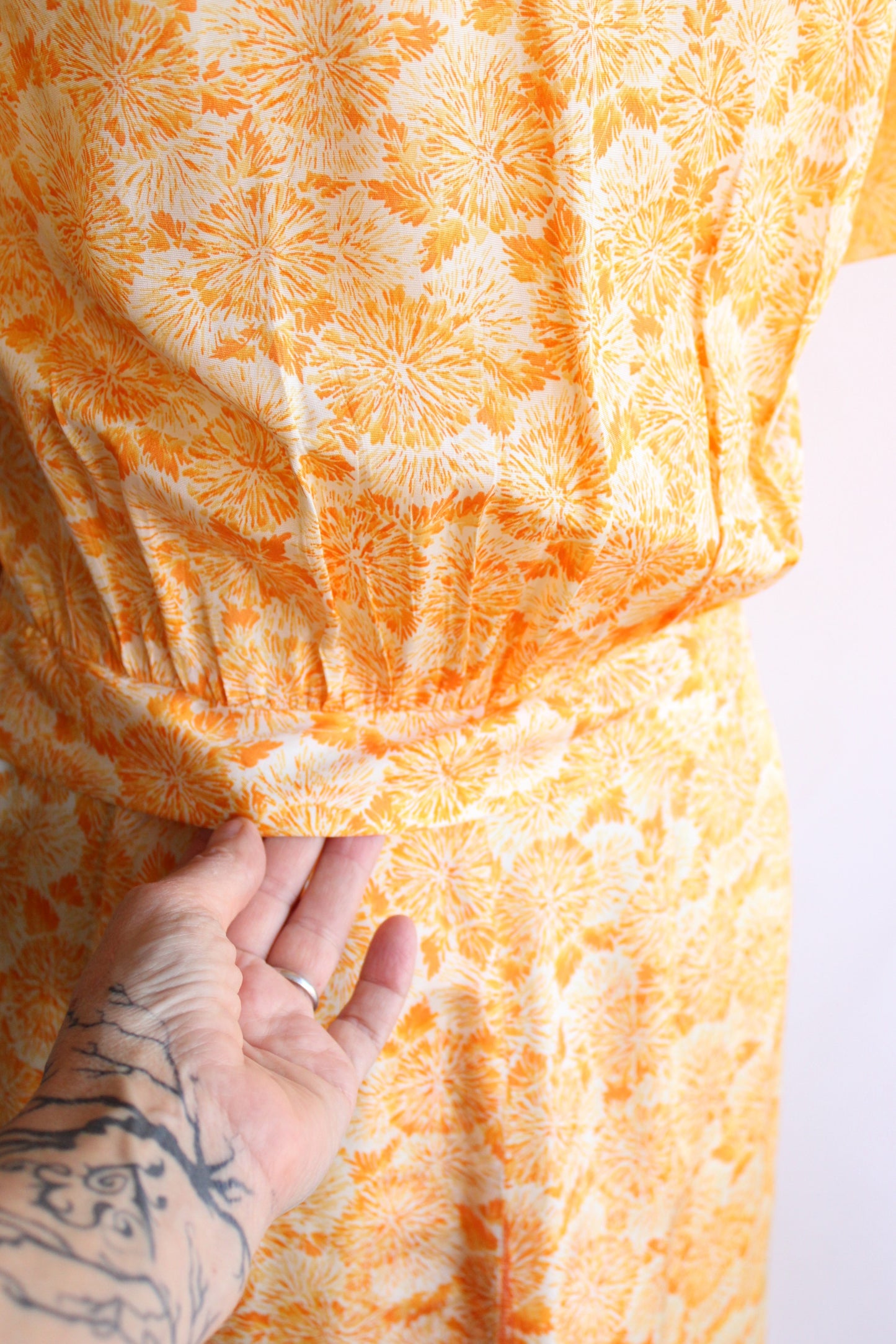 Vintage 1950s Day Dress in an Orange Abstract Floral