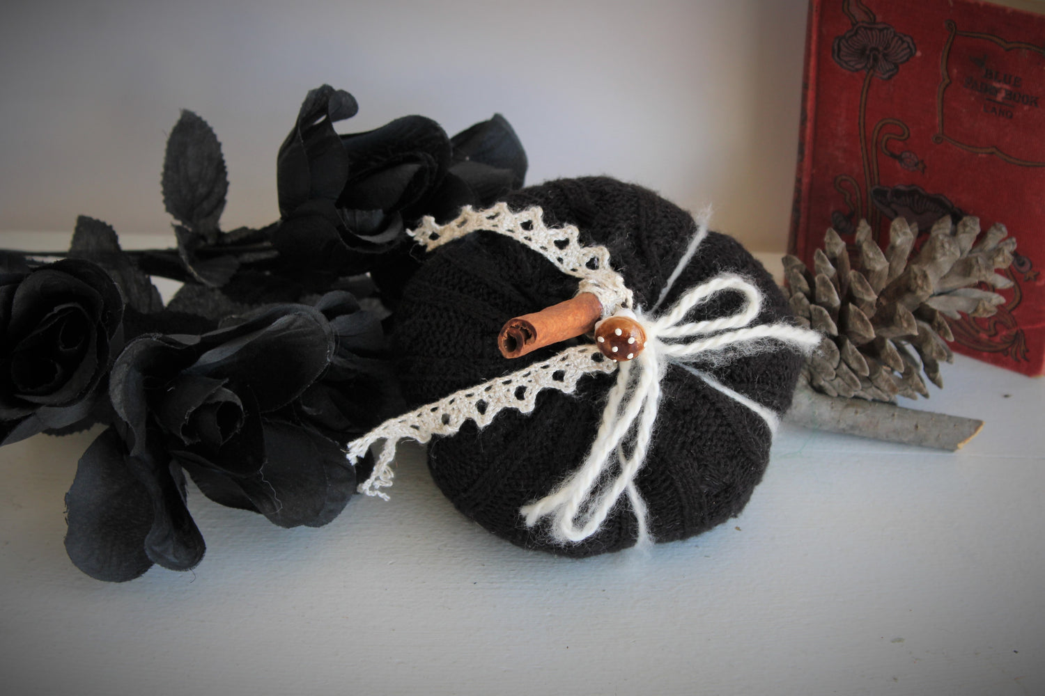 Black Knit Pumpkin Pillow Pouf, With Ivory Lace, Mini Toadstool and Cinnamon Stick Stem