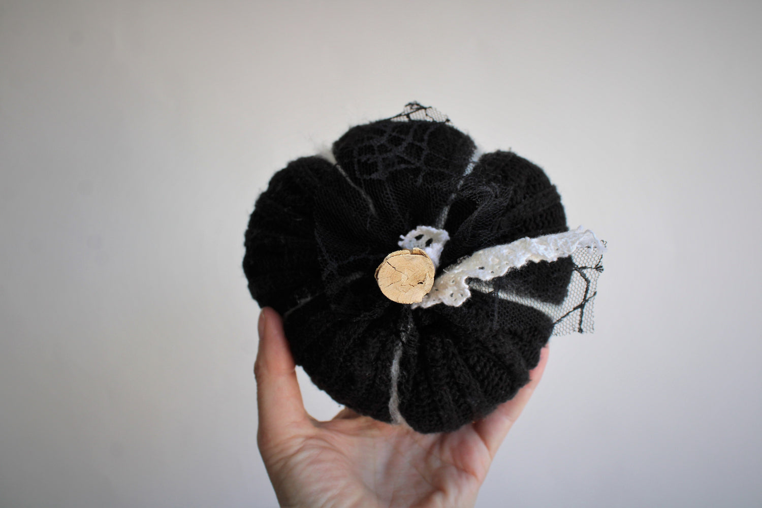 Black Knit Pumpkin Pillow Pouf, With Black Spiderweb Lace, Ivory Lace and Wooden Stem