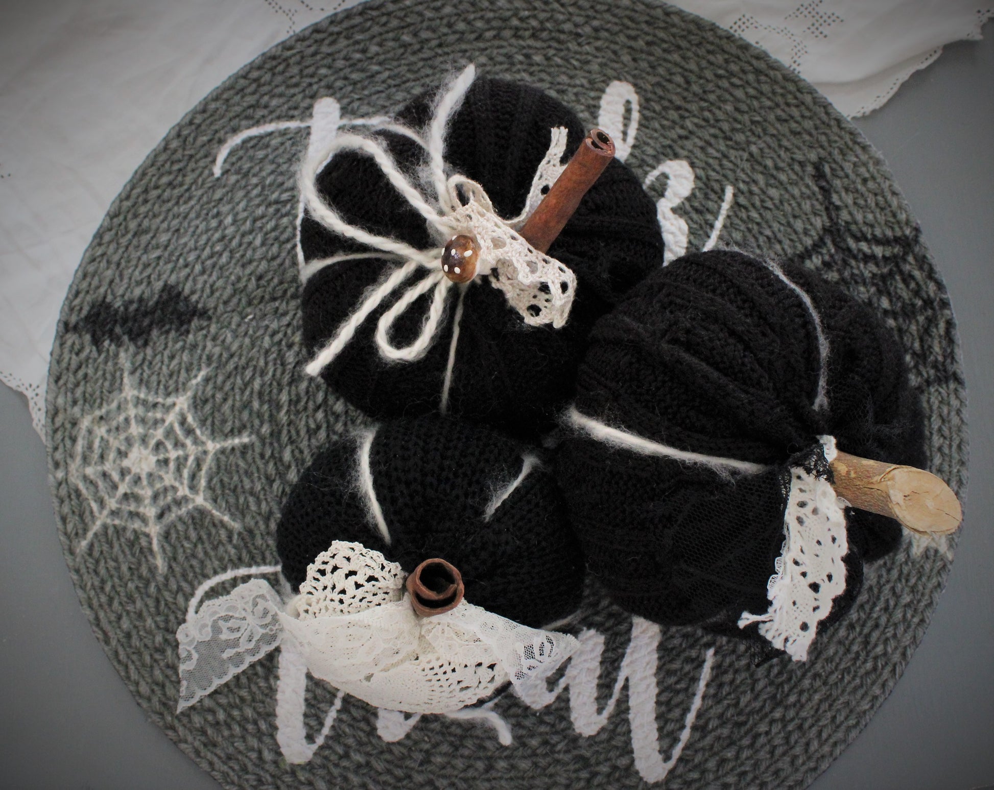 Black Knit Pumpkin Pillow Pouf, With Black Spiderweb Lace, Ivory Lace and Wooden Stem