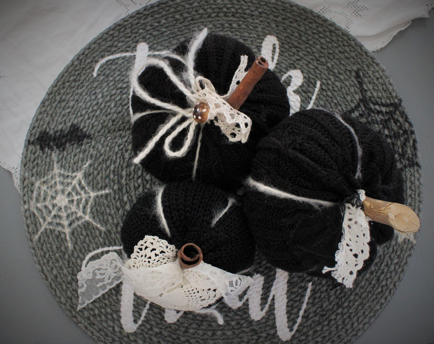 Black Knit Pumpkin Pillow Pouf, With Black Spiderweb Lace, Ivory Lace and Wooden Stem