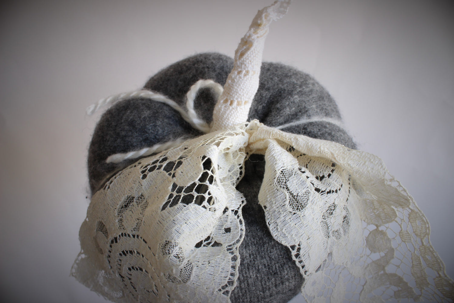 Knit Pumpkin PIllow Pouf in Gray Wool With Ivory Lace Leaves and Stem