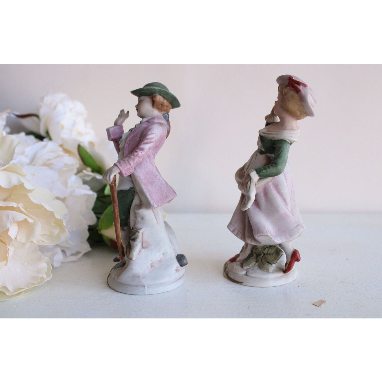 Vintage Bisque Porcelain Man and Woman Figurines